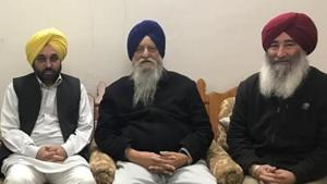 Punjab AAP president and Sangrur MP Bhagwant Mann with SAD (Taksali) president and Khadoor Sahib MP Ranjit Singh Brahmpura and his son Ravinder Singh Brahmpura in Amritsar.(HT FILE) Punjab AAP president and Sangrur MP Bhagwant Mann with SAD (Taksali) president and Khadoor Sahib MP Ranjit Singh Brahmpura and his son Ravinder Singh Brahmpura in Amritsar.(HT FILE)