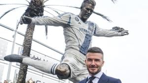 Former LA Galaxy MLS soccer midfielder David Beckham poses with a statue of himself at Legends Plaza in front of Dignity Health Sports Park in Carson.(AP) Former LA Galaxy MLS soccer midfielder David Beckham poses with a statue of himself at Legends Plaza in front of Dignity Health Sports Park in Carson.(AP)