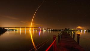 A SpaceX Falcon 9 rocket, carrying the Crew Dragon spacecraft, lifts off on an uncrewed test flight to the International Space Station from the Kennedy Space Center as viewed in Vero Beach, Florida, U.S.(Reuters) A SpaceX Falcon 9 rocket, carrying the Crew Dragon spacecraft, lifts off on an uncrewed test flight to the International Space Station from the Kennedy Space Center as viewed in Vero Beach, Florida, U.S.(Reuters)