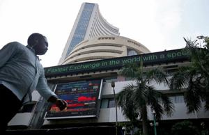 The BSE benchmark Sensex Friday started on a negative note tracking weak cues from other Asian markets amid heavy selling by domestic institutional investors and depreciating rupee.(REUTERS/Representative) The BSE benchmark Sensex Friday started on a negative note tracking weak cues from other Asian markets amid heavy selling by domestic institutional investors and depreciating rupee.(REUTERS/Representative)