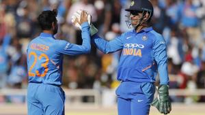 Kuleep Yadav, left, celebrates with teammate Mahendra Singh Dhoni the dismissal of Australia's captain Aaron Finch.(AP) Kuleep Yadav, left, celebrates with teammate Mahendra Singh Dhoni the dismissal of Australia's captain Aaron Finch.(AP)