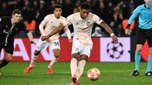 Manchester United's Marcus Rashford scores a penalty during the UEFA Champions League round of 16 second-leg match against Paris Saint-Germain (PSG).(AFP) Manchester United's Marcus Rashford scores a penalty during the UEFA Champions League round of 16 second-leg match against Paris Saint-Germain (PSG).(AFP)