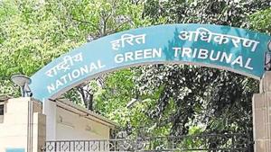 The National Green Tribunal (NGT) on Wednesday directed the Municipal Corporation of Gurugram (MCG) and its concessionaire for waste management in the city, Ecogreen Energy, to seek environmental clearance for the Bandhwari landfill from the ministry of environment and forests (MoEF) at the earliest.(HT File Photo) The National Green Tribunal (NGT) on Wednesday directed the Municipal Corporation of Gurugram (MCG) and its concessionaire for waste management in the city, Ecogreen Energy, to seek environmental clearance for the Bandhwari landfill from the ministry of environment and forests (MoEF) at the earliest.(HT File Photo)