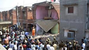 A team of the National Disaster Response Force was deployed after a house collapsed due to LPG cylinder blast at Lal Qater near Vijay Nagar on Saturday morning, in Ghaziabad.(Sakib Ali /HT Photo) A team of the National Disaster Response Force was deployed after a house collapsed due to LPG cylinder blast at Lal Qater near Vijay Nagar on Saturday morning, in Ghaziabad.(Sakib Ali /HT Photo)