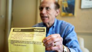 Robert Fink holds up a telegram from a family friend congratulating him on his 1969 graduation from the University of Michigan at his home in Huntington Woods, Mich.(AP File Photo) Robert Fink holds up a telegram from a family friend congratulating him on his 1969 graduation from the University of Michigan at his home in Huntington Woods, Mich.(AP File Photo)