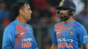 Virat Kohli (R) and MS Dhoni walk together during the second T20 international match between India and Australia.(AFP) Virat Kohli (R) and MS Dhoni walk together during the second T20 international match between India and Australia.(AFP)
