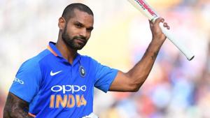 India cricketer Shikhar Dhawan raises his bat to acknowledge the crowd as he walks back after his dismissal during the fourth one-day international (ODI) cricket match between India and Australia at the Punjab Cricket Association Stadium in Mohali on March 10, 2019.(AFP) India cricketer Shikhar Dhawan raises his bat to acknowledge the crowd as he walks back after his dismissal during the fourth one-day international (ODI) cricket match between India and Australia at the Punjab Cricket Association Stadium in Mohali on March 10, 2019.(AFP)