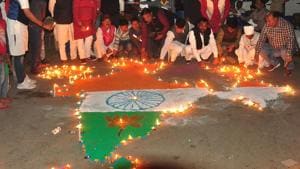 People light oil lamps to pay tribute to the martyrs of Pulwama terror attack and celebrate Indian Air Force's pre-emptive strike in Balakot, Feb 26(PTI) People light oil lamps to pay tribute to the martyrs of Pulwama terror attack and celebrate Indian Air Force's pre-emptive strike in Balakot, Feb 26(PTI)