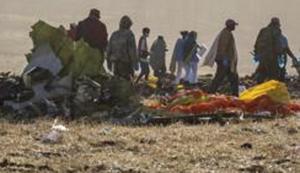 Rescuers work at the scene of an Ethiopian Airlines flight crash near Bishoftu, or Debre Zeit, south of Addis Ababa, Ethiopia, Monday, March 11, 2019. A spokesman says Ethiopian Airlines has grounded all its Boeing 737 Max 8 aircraft as a safety precaution, following the crash of one of its planes in which 157 people were killed. (AP Photo/Mulugeta Ayene)(AP) Rescuers work at the scene of an Ethiopian Airlines flight crash near Bishoftu, or Debre Zeit, south of Addis Ababa, Ethiopia, Monday, March 11, 2019. A spokesman says Ethiopian Airlines has grounded all its Boeing 737 Max 8 aircraft as a safety precaution, following the crash of one of its planes in which 157 people were killed. (AP Photo/Mulugeta Ayene)(AP)