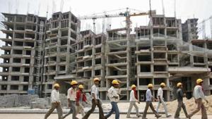 Labour migrants do not only construct buildings, sweep floors, clean trucks, sew clothes and deliver goods. Their movement across the country makes the idea of India a concrete reality for the majority of her poor and impoverished populations.(REUTERS) Labour migrants do not only construct buildings, sweep floors, clean trucks, sew clothes and deliver goods. Their movement across the country makes the idea of India a concrete reality for the majority of her poor and impoverished populations.(REUTERS)