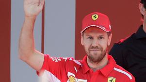 Ferrari driver Sebastian Vettel of Germany waves during the launch for the Australian Grand Prix in Melbourne, Australia, Wednesday.(AP) Ferrari driver Sebastian Vettel of Germany waves during the launch for the Australian Grand Prix in Melbourne, Australia, Wednesday.(AP)