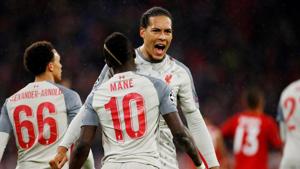 Liverpool's Sadio Mane celebrates scoring their third goal with Virgil van Dijk.(Action Images via Reuters) Liverpool's Sadio Mane celebrates scoring their third goal with Virgil van Dijk.(Action Images via Reuters)
