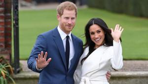 FILE PHOTO: Britain’s Prince Harry poses with Meghan Markle in the Sunken Garden of Kensington Palace, London, Britain, November 27, 2017.(REUTERS/Eddie Mulholland)