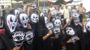 People dress up as ghosts in a rally to protest against recently pulled out Bengali film ‘Bhobishyoter Bhoot' from multiplexes and cinema halls without explanation from Madhusudhan Manch in Kolkata.(Samir Jana/Hindustan Times)
