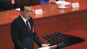 Chinese Premier Li Keqiang delivers the work reports at the opening session of the China's National People's Congress at the Great Hall of the People in Beijing on March 5ng)(AP) Chinese Premier Li Keqiang delivers the work reports at the opening session of the China's National People's Congress at the Great Hall of the People in Beijing on March 5ng)(AP)
