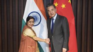 A file photo of Xinhua News Agency, shows Chinese Foreign Minister Wang Yi, right, shakes hands with his Indian counterpart Sushma Swaraj at a meeting in Wuzhen Town, east China's Zhejiang Province.(AP) A file photo of Xinhua News Agency, shows Chinese Foreign Minister Wang Yi, right, shakes hands with his Indian counterpart Sushma Swaraj at a meeting in Wuzhen Town, east China's Zhejiang Province.(AP)
