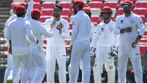 Afghanistan's Rashid Khan celebrates a wicket with his teammates.(AFP) Afghanistan's Rashid Khan celebrates a wicket with his teammates.(AFP)