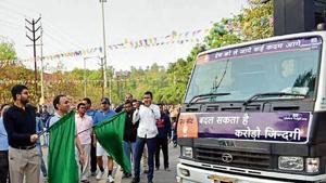 Ranchi deputy commissioner Rai Mahimapat Ray (in black) flags off an awareness vehicle.(HT Photo) Ranchi deputy commissioner Rai Mahimapat Ray (in black) flags off an awareness vehicle.(HT Photo)