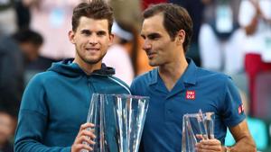 Dominic Thiem of Austria holds the championship trophy after his men's singles final victory.(AFP) Dominic Thiem of Austria holds the championship trophy after his men's singles final victory.(AFP)