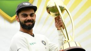 Virat Kohli lifts the Border-Gavaskar Trophy as they celebrate a 2-1 series victory over Australia.(REUTERS) Virat Kohli lifts the Border-Gavaskar Trophy as they celebrate a 2-1 series victory over Australia.(REUTERS)