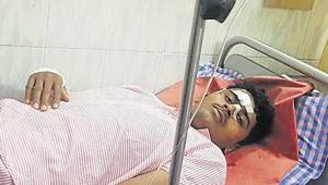 24-year-old Ankush Kendre, a forest guard at the SNGP, who was attacked on Tuesday, is being treated at a hospital.(HT Photo) 24-year-old Ankush Kendre, a forest guard at the SNGP, who was attacked on Tuesday, is being treated at a hospital.(HT Photo)