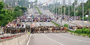Violent mobs ready to clash with police in Panchkula in 2017, moments after self-styled godman Ram Rahim Singh was convicted of rape — one in a series of law-and-order challenges for the Khattar government.(File Photo) Violent mobs ready to clash with police in Panchkula in 2017, moments after self-styled godman Ram Rahim Singh was convicted of rape — one in a series of law-and-order challenges for the Khattar government.(File Photo)