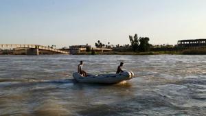 Iraqi rescuers search for survivors over the site where an overloaded ferry sank in the Tigris river near Mosul in Iraq, March, 21,2019. REUTERS/Stringer(REUTERS) Iraqi rescuers search for survivors over the site where an overloaded ferry sank in the Tigris river near Mosul in Iraq, March, 21,2019. REUTERS/Stringer(REUTERS)