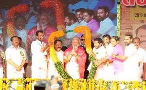 Prime Minister Narendra Modi is garlanded by BJP members during the Yuva Morcha meet, at Thekkinkad Maidanam, in Thrissur, Kerala, India, on Sunday, January 27, 2019.(Photo by Vivek R Nair / Hindustan Times) Prime Minister Narendra Modi is garlanded by BJP members during the Yuva Morcha meet, at Thekkinkad Maidanam, in Thrissur, Kerala, India, on Sunday, January 27, 2019.(Photo by Vivek R Nair / Hindustan Times)