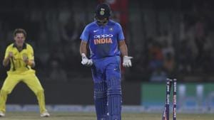 India's Rohit Sharma looks at his hands after his bat slipped and he was stumped out during the final ODI against Australia.(AP) India's Rohit Sharma looks at his hands after his bat slipped and he was stumped out during the final ODI against Australia.(AP)