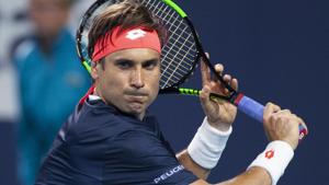 David Ferrer, of Spain, watches the ball before hitting a return to Alexander Zverev, of Germany.(AP) David Ferrer, of Spain, watches the ball before hitting a return to Alexander Zverev, of Germany.(AP)