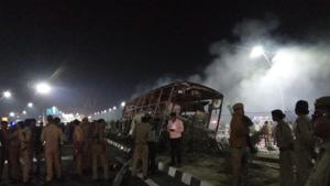The burnt out shell of the bus which caught fire after smashing into a divider.(HT PHOTO) The burnt out shell of the bus which caught fire after smashing into a divider.(HT PHOTO)