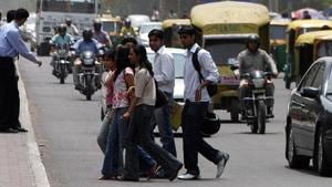 Students walk the most. But too many vehicles, encroachments and poor pedestrian infrastructure often make the walking routes to educational institutions, barring a few university campuses, unsafe.(HT File Photo) Students walk the most. But too many vehicles, encroachments and poor pedestrian infrastructure often make the walking routes to educational institutions, barring a few university campuses, unsafe.(HT File Photo)