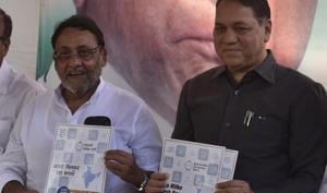 Mumbai, India - March 25, 2019: NCP leader Dilip Walse-Patil and Nawab Malik addressing to media during official release of manifesto for the upcoming Lok Sabha election at Nariman Point in Mumbai, India, on Monday, March 25, 2019. (Photo by Anshuman Poyrekar/Hindustan Times)(Anshuman Poyrekar/HT Photo) Mumbai, India - March 25, 2019: NCP leader Dilip Walse-Patil and Nawab Malik addressing to media during official release of manifesto for the upcoming Lok Sabha election at Nariman Point in Mumbai, India, on Monday, March 25, 2019. (Photo by Anshuman Poyrekar/Hindustan Times)(Anshuman Poyrekar/HT Photo)