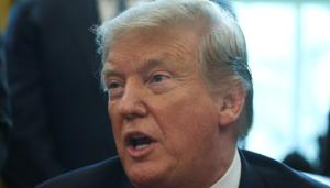 US President Donald Trump speaks while welcoming the Stanley Cup champion Capitals in the Oval Office at the White House in Washington on March 25.(REUTERS)