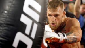 Conor McGregor of Ireland hits a heavy bag during a workout at the UFC Performance Center.(REUTERS) Conor McGregor of Ireland hits a heavy bag during a workout at the UFC Performance Center.(REUTERS)