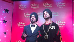 Diljit Dosanjh with his wax statue at Madame Tussauds New Delhi. Diljit Dosanjh with his wax statue at Madame Tussauds New Delhi.