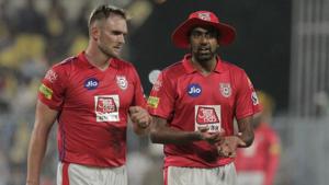 Kings XI Punjab's captain Ravichandran Ashwin, right talks to bowler Hardus Viljeoen(AP) Kings XI Punjab's captain Ravichandran Ashwin, right talks to bowler Hardus Viljeoen(AP)