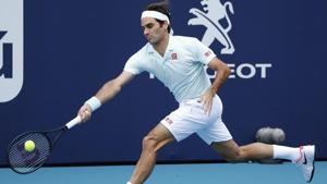 Roger Federer returns a volley to Daniil Medvedev during their Miami Open clash.(AP) Roger Federer returns a volley to Daniil Medvedev during their Miami Open clash.(AP)