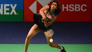 PV Sindhu plays a return against Hong Kong badminton player Deng Joy Xuan.(AFP) PV Sindhu plays a return against Hong Kong badminton player Deng Joy Xuan.(AFP)