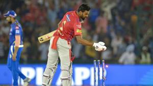 Kings XI Punjab cricketer K. L. Rahul takes off wicket bails after winning the match.(AFP) Kings XI Punjab cricketer K. L. Rahul takes off wicket bails after winning the match.(AFP)