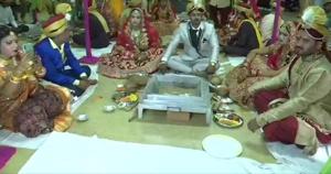 It was a festival-like atmosphere at Pujari Park Marriage Palace here where the weddings took place as per Hindu traditions.(Photo: Twitter/ANI) It was a festival-like atmosphere at Pujari Park Marriage Palace here where the weddings took place as per Hindu traditions.(Photo: Twitter/ANI)