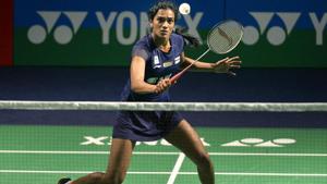 PV Sindhu plays a shot against China's badminton player He Bingjiao.(AFP) PV Sindhu plays a shot against China's badminton player He Bingjiao.(AFP)
