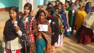 Dumka , Jharkhand, INDIA – December 20: Voters queue waiting to cast their votes on 5th phase election of Jharkhand assembly poll for Santhal Praganna at a polling booth in Dumka on Saturday December 20, 2014(Hindustan Times)