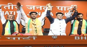 Samajwadi party leader Dr Rajendra Singh(left), Ram Sakal Gurjar(second from left). RLSP vice-president Shiv Raj(right) join the BJP in the presence of Union minister of railways Piyush Goyal at the party headquarters in New Delhi.(HT) Samajwadi party leader Dr Rajendra Singh(left), Ram Sakal Gurjar(second from left). RLSP vice-president Shiv Raj(right) join the BJP in the presence of Union minister of railways Piyush Goyal at the party headquarters in New Delhi.(HT)