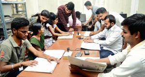 Members of Divya Zhep from SP college at the college library with visually impaired and disabled friends on Thursday.(RAVINDRA JOSHI/ HT PHOTO) Members of Divya Zhep from SP college at the college library with visually impaired and disabled friends on Thursday.(RAVINDRA JOSHI/ HT PHOTO)