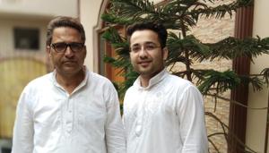 Junaid Ahmad of Uttar Pradesh secured the third rank in the Union Public Service Commission (UPSC) examination, results of which were declared on Friday. Junaid standing with his father in the picture.(HT photo) Junaid Ahmad of Uttar Pradesh secured the third rank in the Union Public Service Commission (UPSC) examination, results of which were declared on Friday. Junaid standing with his father in the picture.(HT photo)