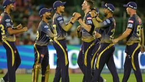 Kolkata Knight Riders cricketers celebrate the dismissal of Rajasthan Royals cricketer Jos Buttler.(AFP) Kolkata Knight Riders cricketers celebrate the dismissal of Rajasthan Royals cricketer Jos Buttler.(AFP)