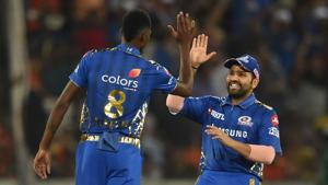Mumbai Indians (MI) captain Rohit Sharma greets bowler Alzari Joseph(PTI) Mumbai Indians (MI) captain Rohit Sharma greets bowler Alzari Joseph(PTI)