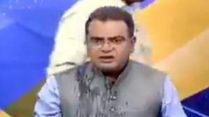 Congress leader throws water at BJP counterpart on live TV for calling him traitor(ANI Photo) Congress leader throws water at BJP counterpart on live TV for calling him traitor(ANI Photo)