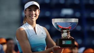 Spain's Garbine Muguruza celebrates winning the Monterrey Open with the trophy.(REUTERS) Spain's Garbine Muguruza celebrates winning the Monterrey Open with the trophy.(REUTERS)